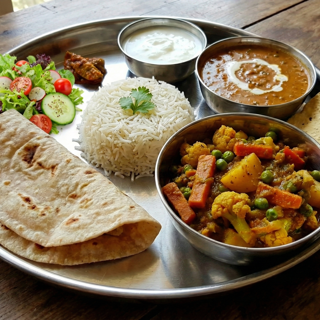 Veggie Thali (Roti, Rice, Dal or Beans & Sabji)